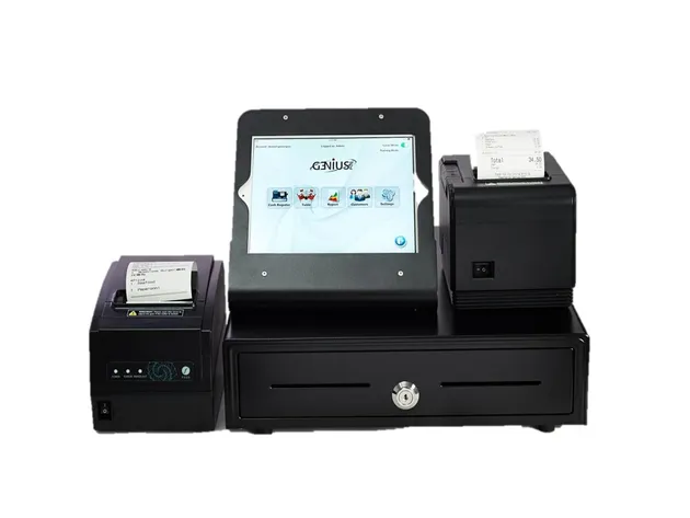A counter setup photographed on white: an iPad in a stand, a cash drawer, and two receipt printers with dockets in them.