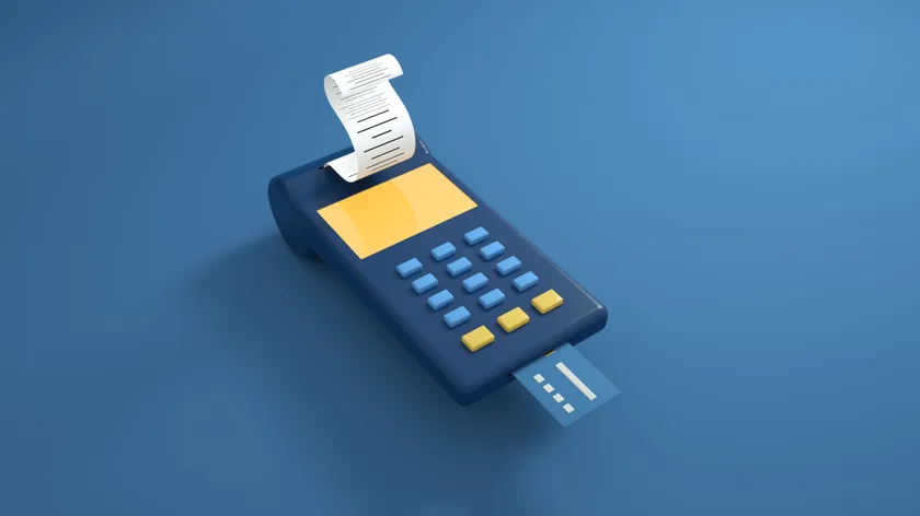 A stylised card payment terminal on a plain blue background, a receipt curling from the slot on top and a plain card in the reader.